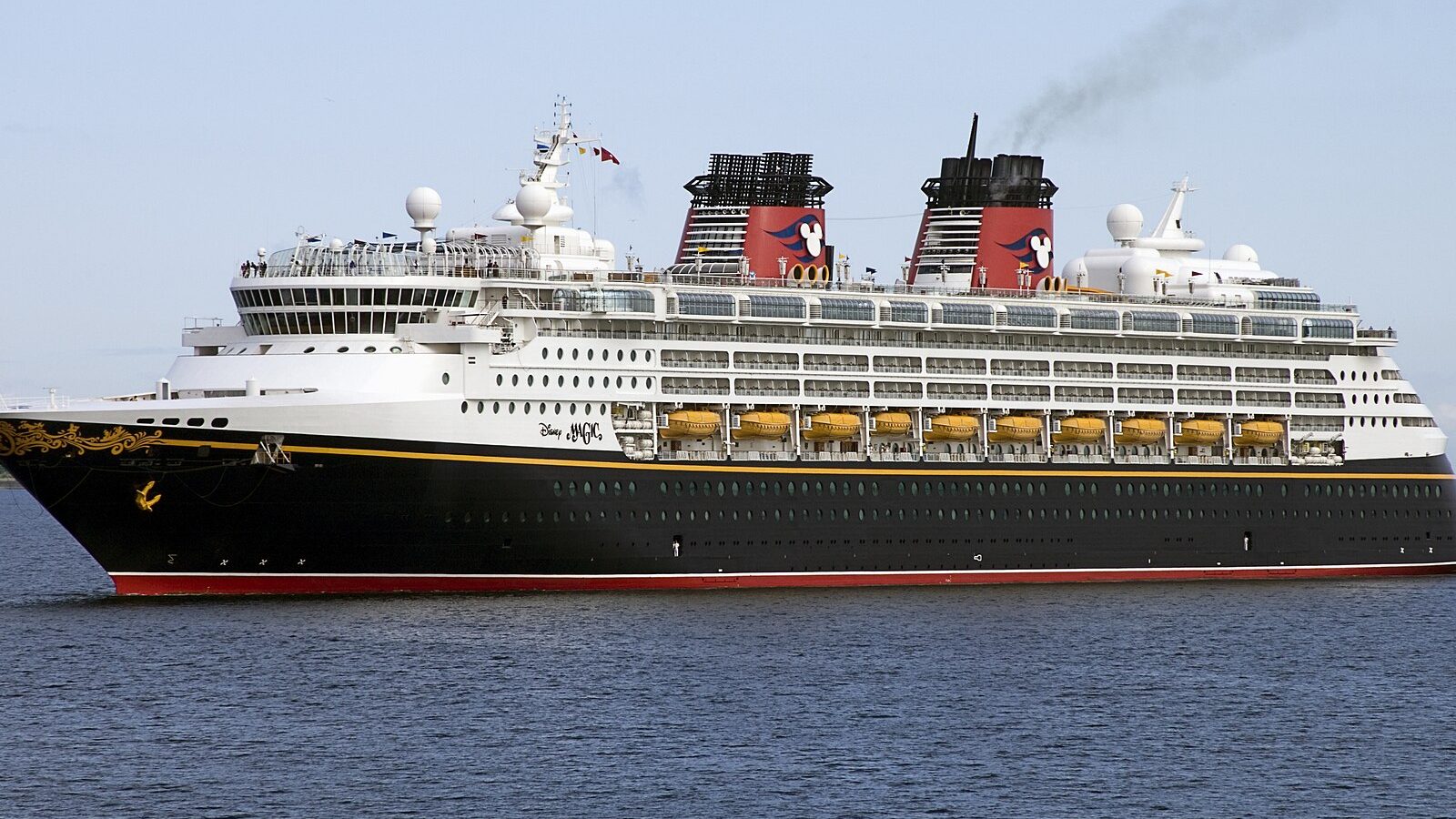 The Disney Magic under way, in profile